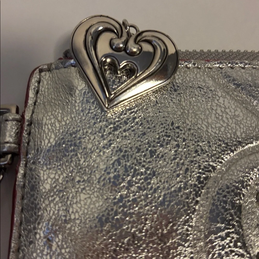 BRIGHTON SILVER METALLIC WRISTLET WITH SOME BLING ON ONE SIDE PLAIN ON THE OTHER